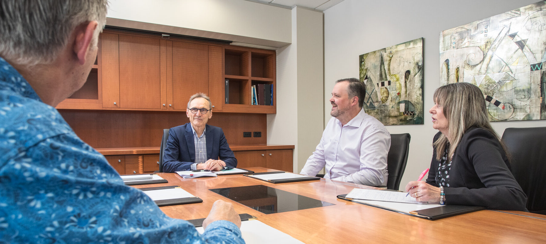 Malcolm Flowers Insurance Client Consultation Cropped